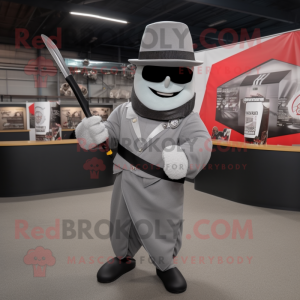 Gray Knife Thrower mascot costume character dressed with a Suit and Hats