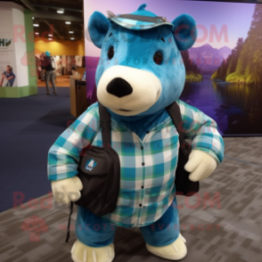 Teal Tapir mascot costume character dressed with a Flannel Shirt and Backpacks