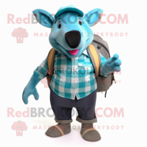 Teal Tapir mascot costume character dressed with a Flannel Shirt and Backpacks