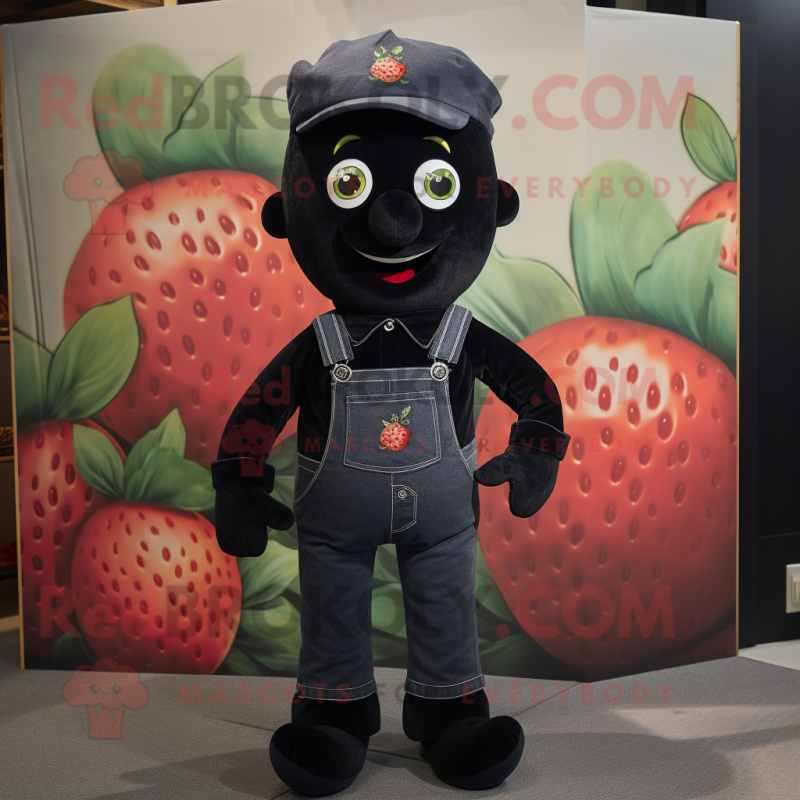 Black Strawberry mascot costume character dressed with a Jeans and Suspenders