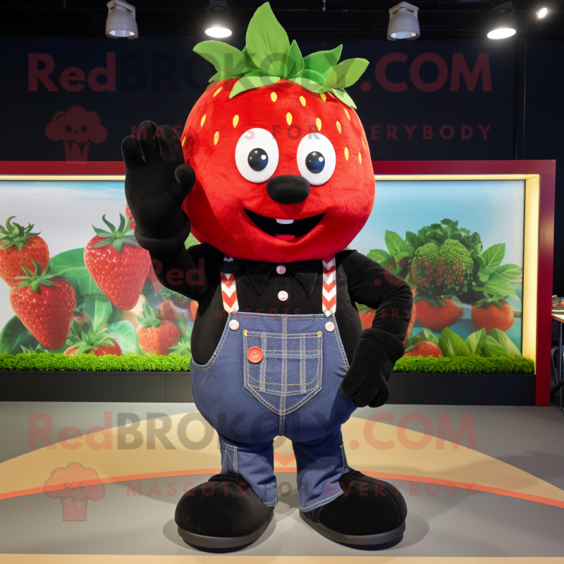 Black Strawberry mascot costume character dressed with a Jeans and Suspenders