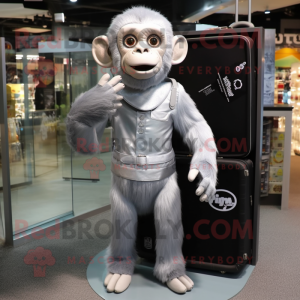 Silver Chimpanzee mascot costume character dressed with a A-Line Dress and Briefcases