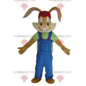 Mascotte coniglio marrone con una bella tuta blu -