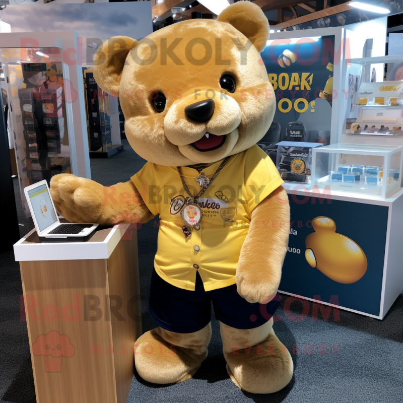 Gold Bear mascot costume character dressed with a Oxford Shirt and Keychains