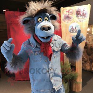 Blue Baboon mascot costume character dressed with a Denim Shirt and Lapel pins