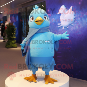 Sky Blue Dove mascot costume character dressed with a Sweater and Beanies