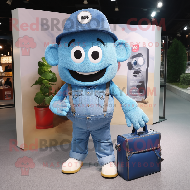 Blue Camera mascot costume character dressed with a Denim Shirt and Tote bags Blue Camera mascot costume character dressed with a Denim Shirt and Tote bags