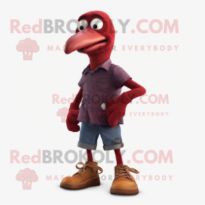 Maroon Dodo Bird mascot costume character dressed with a Bootcut Jeans and Shoe laces