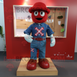 Red Celtic Cross mascot costume character dressed with a Denim Shorts and Cufflinks