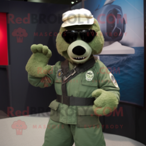 Green Navy Seal mascot costume character dressed with a Blazer and Mittens