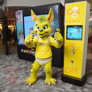 Yellow Gargoyle mascot costume character dressed with a Polo Shirt and Digital watches