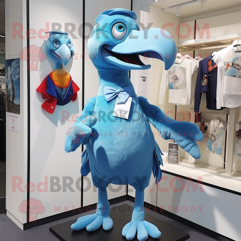 Sky Blue Dodo Bird mascot costume character dressed with a Oxford Shirt and Brooches Sky Blue Dodo Bird mascot costume character dressed with a Oxford Shirt and Brooches