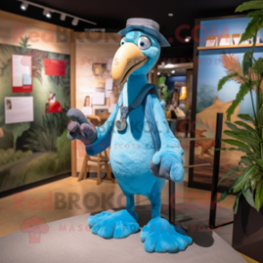 Sky Blue Dodo Bird mascot costume character dressed with a Oxford Shirt and Brooches