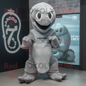 Gray Hydra mascot costume character dressed with a Cover-up and Beanies