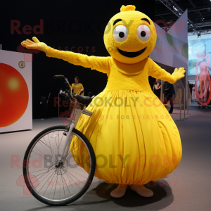 Yellow Unicyclist mascot costume character dressed with a Ball Gown and Mittens