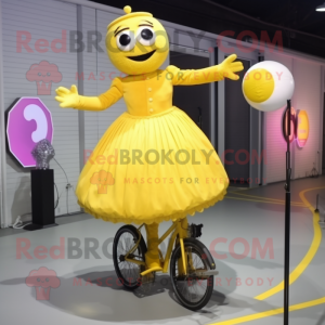 Yellow Unicyclist mascot costume character dressed with a Ball Gown and Mittens
