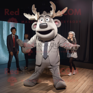 Silver Elk mascot costume character dressed with a Suit and Hair clips