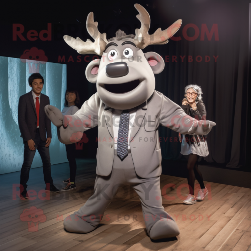 Silver Elk mascot costume character dressed with a Suit and Hair clips Silver Elk mascot costume character dressed with a Suit and Hair clips