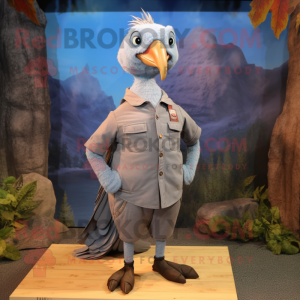 Gray Pheasant mascot costume character dressed with a Denim Shirt and Foot pads