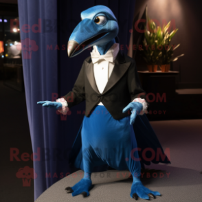 Blue Dimorphodon mascot costume character dressed with a Tuxedo and Shawl pins