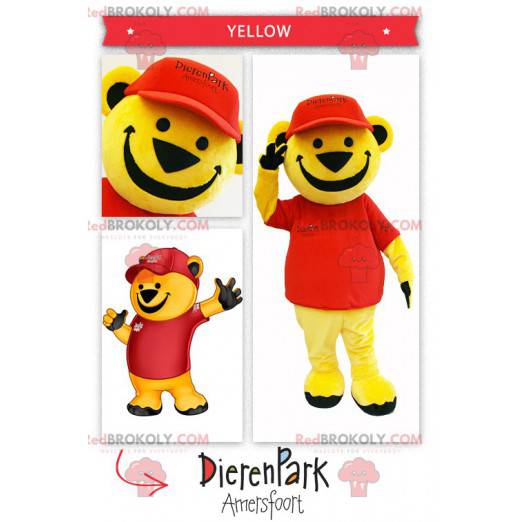 Stor gul bjørnemaskot kledd i rødt - Redbrokoly.com