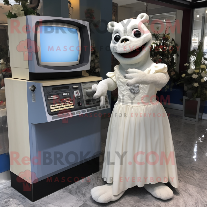 Gray Television mascot costume character dressed with a Wedding Dress and Keychains Gray Television mascot costume character dressed with a Wedding Dress and Keychains