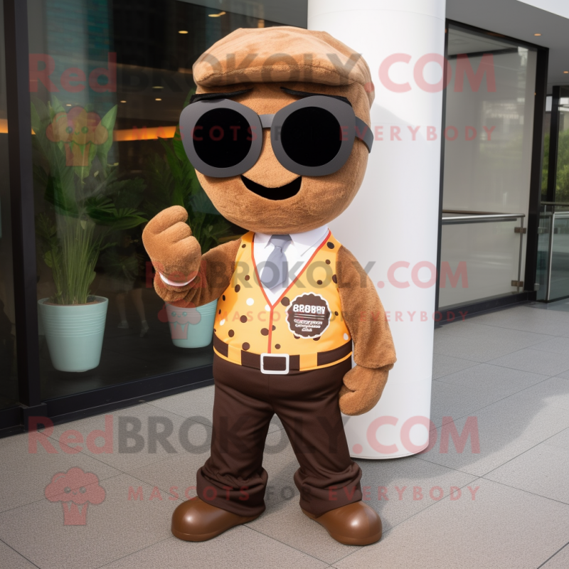 Brown Bagels mascot costume character dressed with a Dress Pants and Sunglasses Brown Bagels mascot costume character dressed with a Dress Pants and Sunglasses
