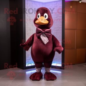 Maroon Dove mascot costume character dressed with a Bodysuit and Bow ties