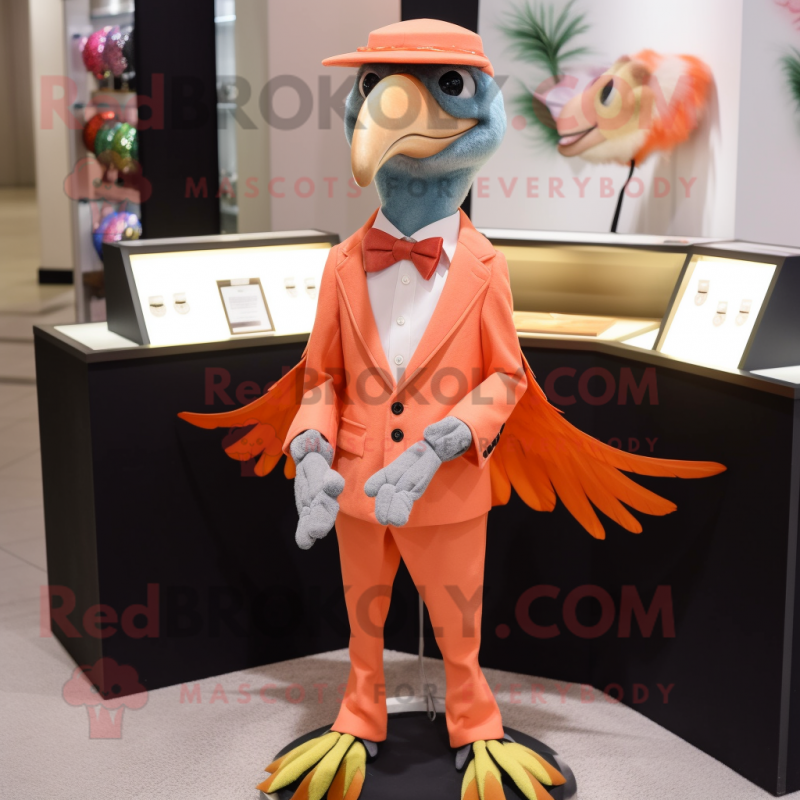 Peach Archeopteryx mascot costume character dressed with a Suit Pants and Necklaces Peach Archeopteryx mascot costume character dressed with a Suit Pants and Necklaces