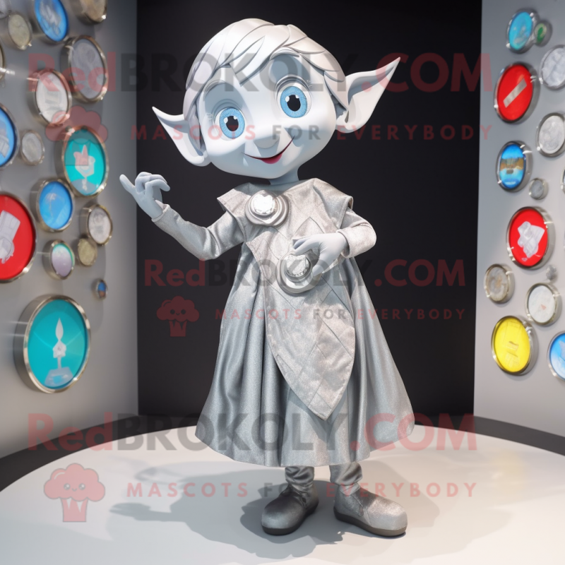 Silver Elf mascot costume character dressed with a Skirt and Coin purses Silver Elf mascot costume character dressed with a Skirt and Coin purses