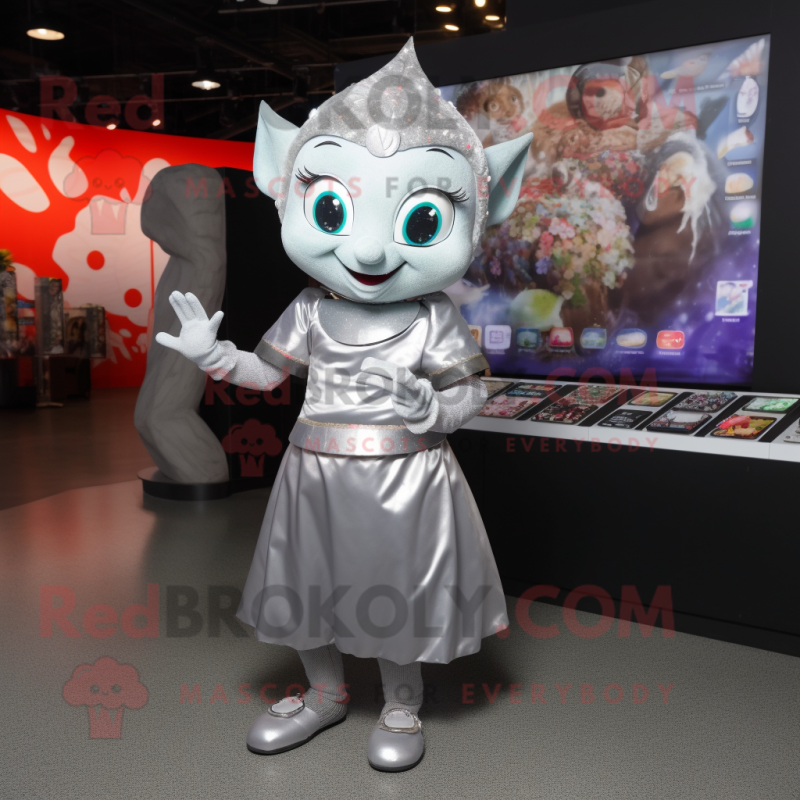 Silver Elf mascot costume character dressed with a Skirt and Coin purses Silver Elf mascot costume character dressed with a Skirt and Coin purses