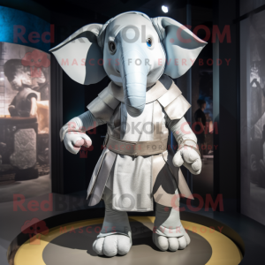 Silver Elephant mascot costume character dressed with a Shorts and Wraps