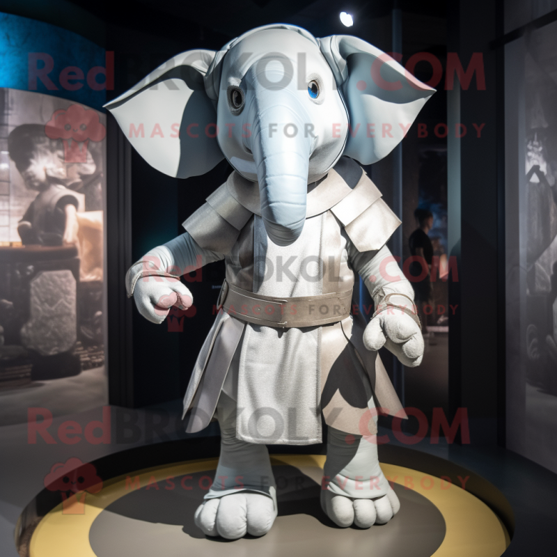 Silver Elephant mascot costume character dressed with a Shorts and Wraps Silver Elephant mascot costume character dressed with a Shorts and Wraps
