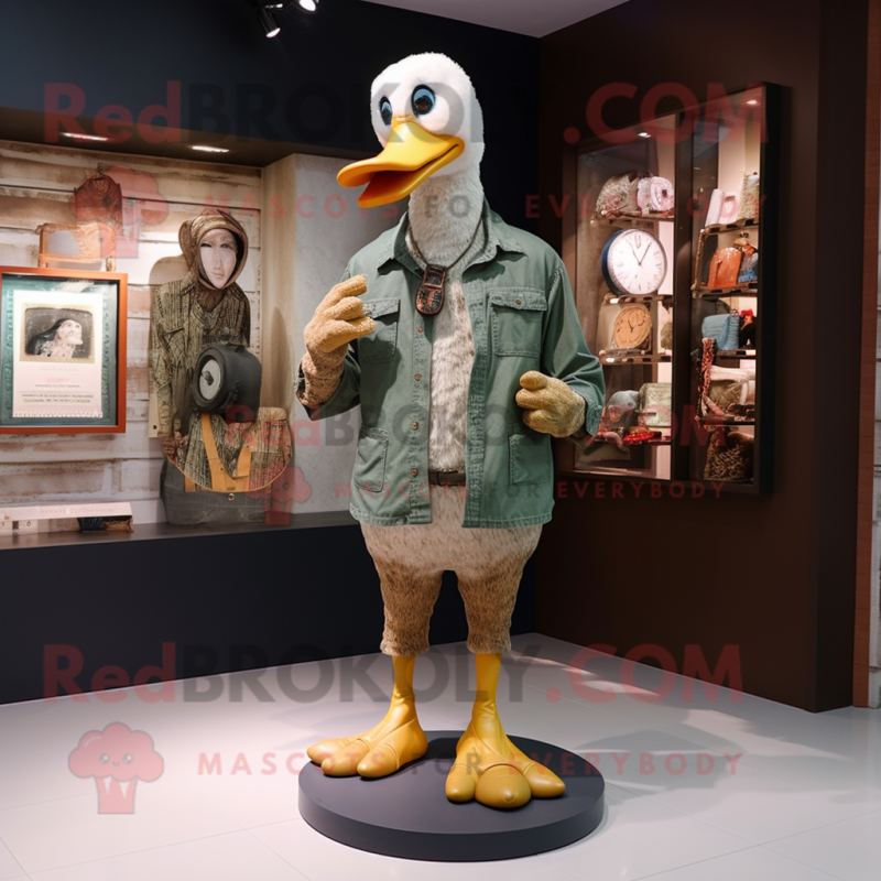 Tan Muscovy Duck mascot costume character dressed with a Bootcut Jeans and Bracelet watches