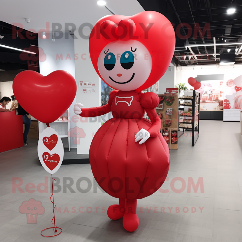 Red Heart Shaped Balloons mascot costume character dressed with a Wrap Dress and Headbands Red Heart Shaped Balloons mascot costume character dressed with a Wrap Dress and Headbands