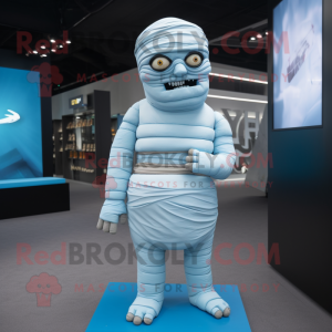 Sky Blue Mummy mascot costume character dressed with a Suit and Belts