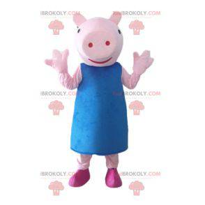 Rosa Schweinemaskottchen mit einem blauen Kleid - Redbrokoly.com
