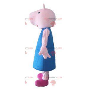 Pink pig mascot with a blue dress - Redbrokoly.com