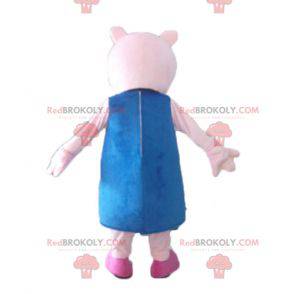 Rosa Schweinemaskottchen mit einem blauen Kleid - Redbrokoly.com