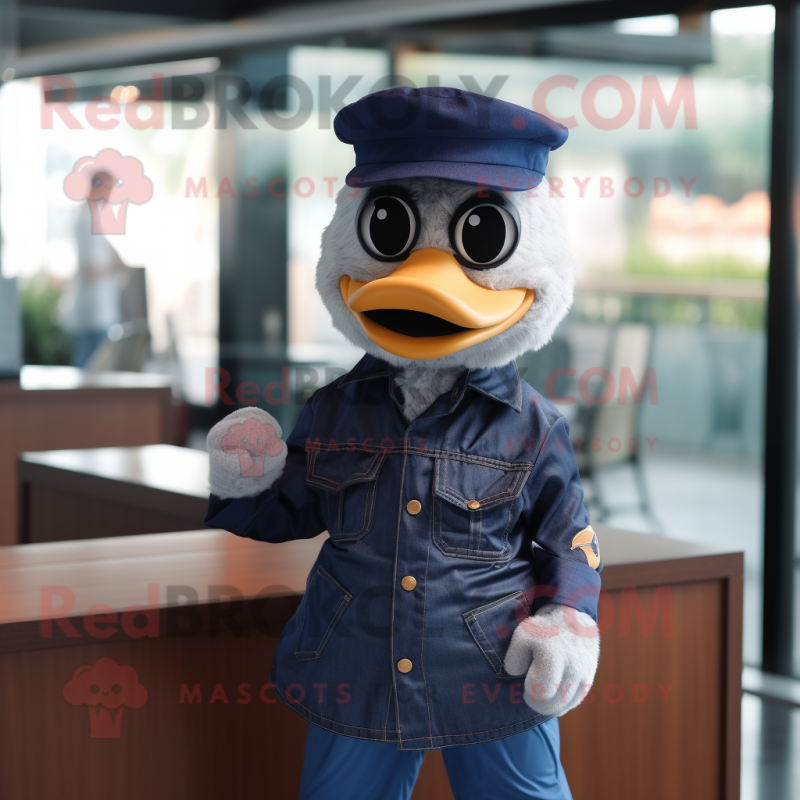 Navy Duck mascot costume character dressed with a Denim Shirt and Headbands