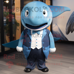 Blue Blue Whale mascot costume character dressed with a Vest and Tie pins