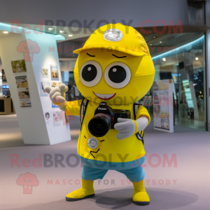 Lemon Yellow Camera mascot costume character dressed with a Shorts and Keychains