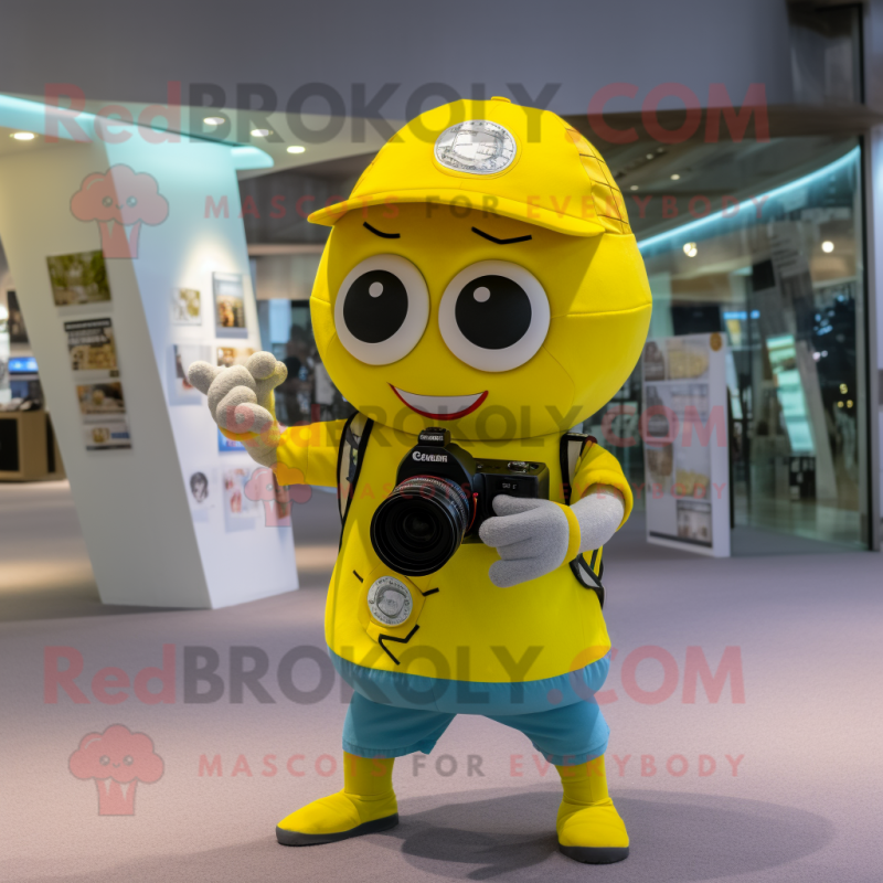 Lemon Yellow Camera mascot costume character dressed with a Shorts and Keychains Lemon Yellow Camera mascot costume character dressed with a Shorts and Keychains