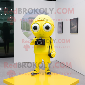 Lemon Yellow Camera mascot costume character dressed with a Shorts and Keychains