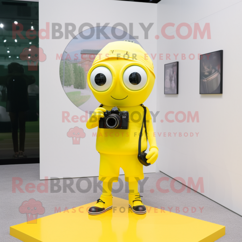 Lemon Yellow Camera mascot costume character dressed with a Shorts and Keychains Lemon Yellow Camera mascot costume character dressed with a Shorts and Keychains