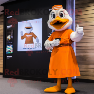Orange Goose mascot costume character dressed with a Empire Waist Dress and Smartwatches