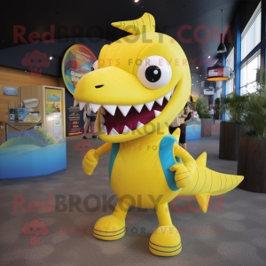 Yellow Barracuda mascot costume character dressed with a Playsuit and Messenger bags