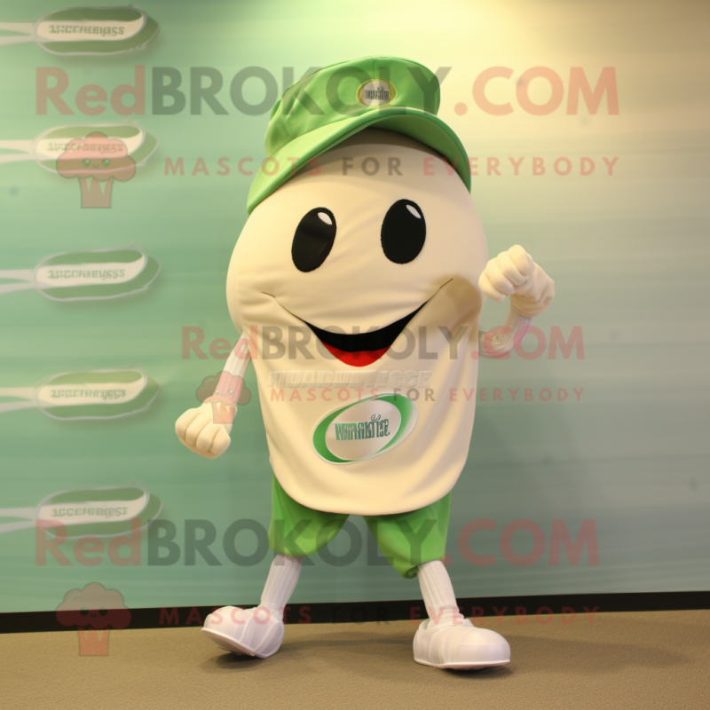 Cream Green Bean mascot costume character dressed with a Running Shorts and Hat pins