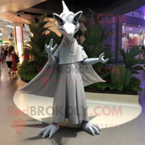 Silver Pterodactyl mascot costume character dressed with a Cover-up and Anklets