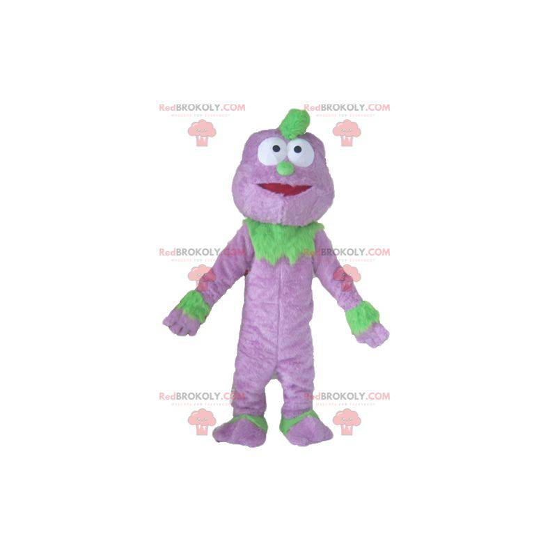Mascotte de monstre violet et vert de marionnette -